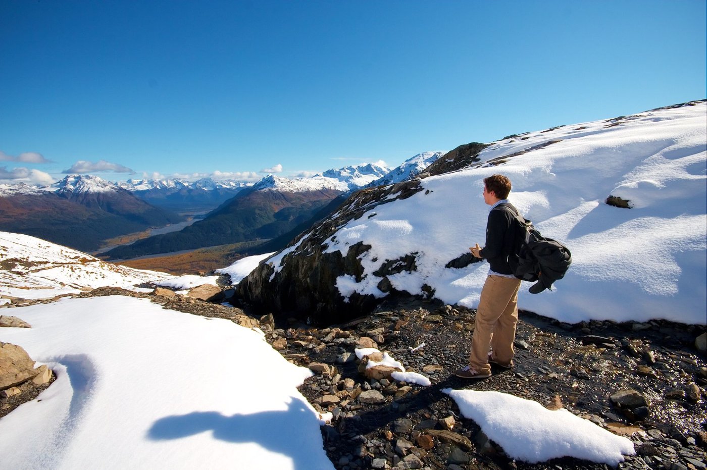 A hiker on the Harding Icefield Trail in Kenai Fjords National Park, Alaska